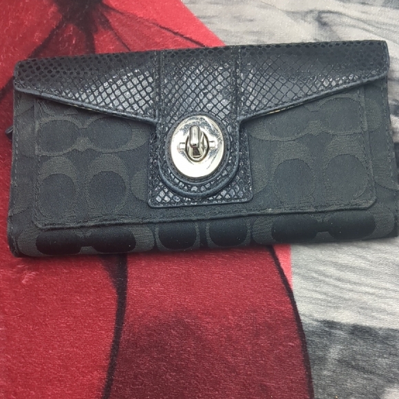 Coach Handbags - Coach Black Leather Wallet with Embossed Signature Pattern